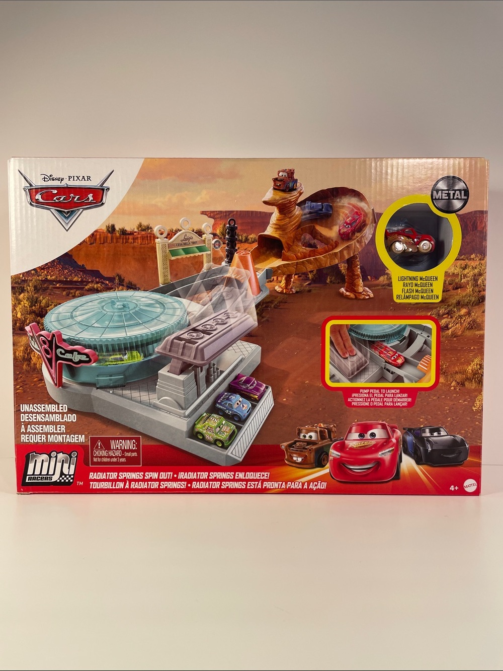 Mini Racers-Cardboard Packaging has dents and a torn spot as shown